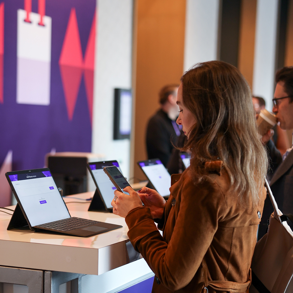 A woman checking in to an event