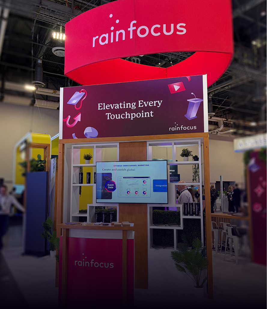 Large RainFocus exhibition booth with curved overhead branding